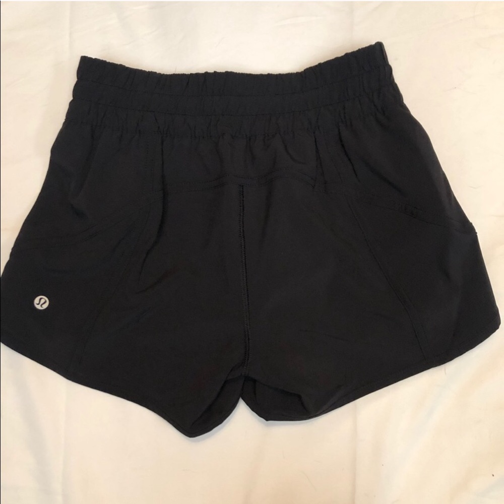 BLACK LULULEMON TRACKER SHORTS EUC